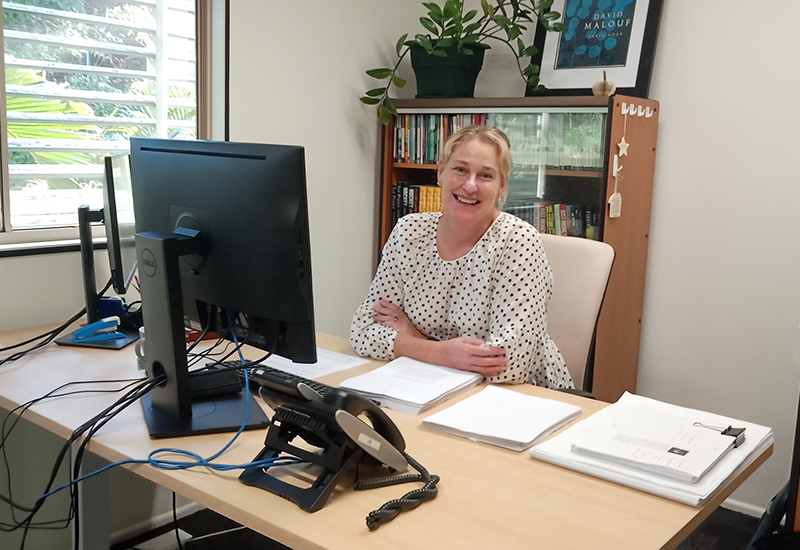 Editor Jacqueline Blanchard at her desk