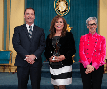 Marie receiving her award