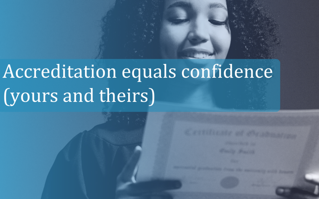 woman smiling looking at accreditation