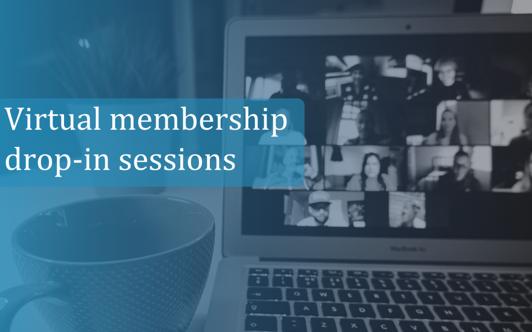 laptop with zoom participants and cup on desk